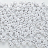 BD00109-02-silver-letter-white-opaque-coin-alphabet-beads-single-z-4×7mm